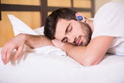 man-sleeping-blue-bedphones-small
